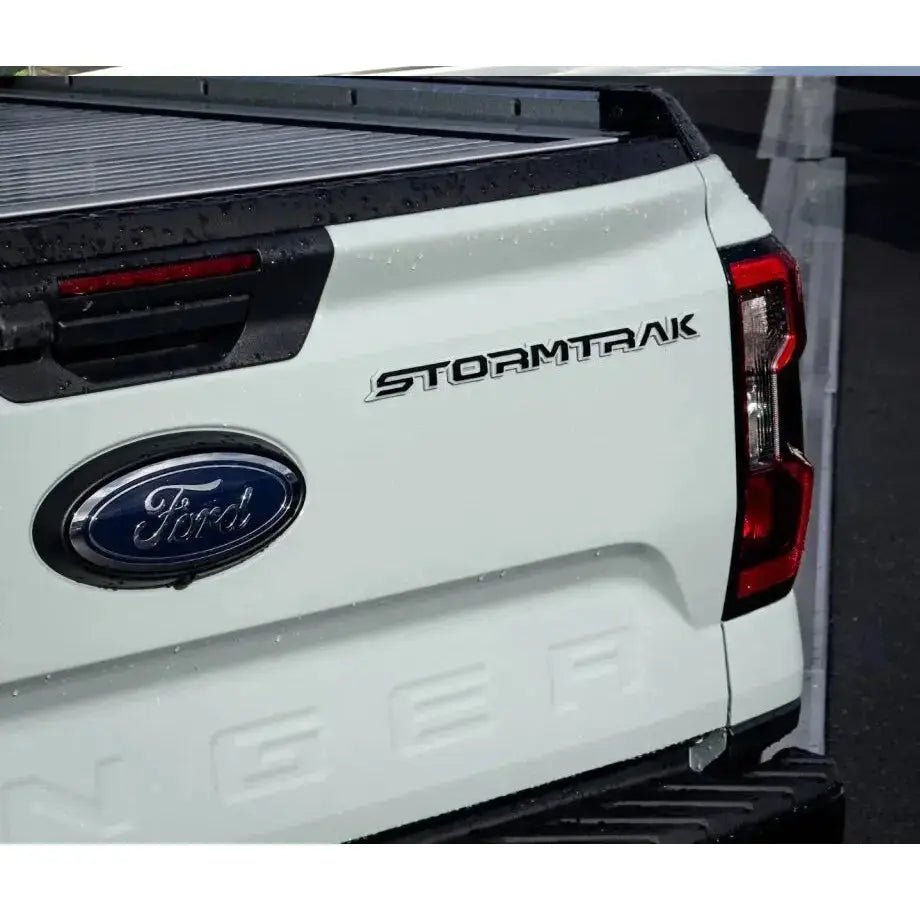 Stormtrak Lettering Badge - (White & Black)