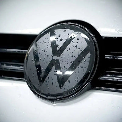 Suitable To Fit - V-W Polo 8 Life (23-On) Smoked Black Stick On Emblem Badge Cover (Pair)